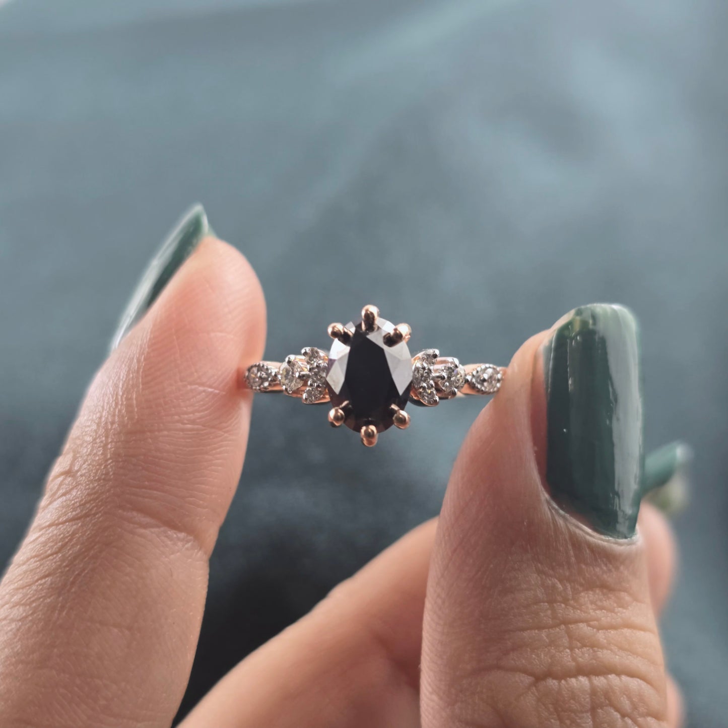 Rose Gold Black Diamond Ring – Oval Cut with White Stone Accents