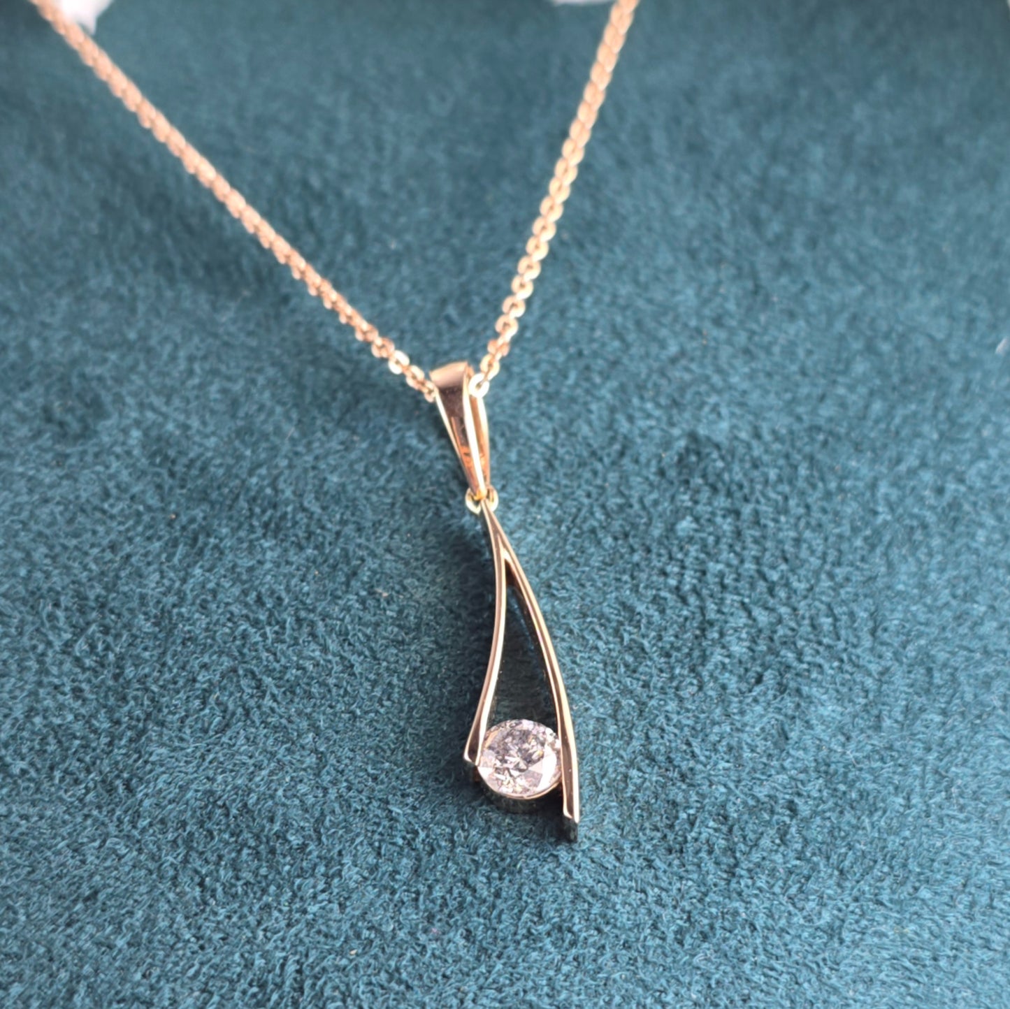 Graceful Curves: Salt & Pepper Diamond Pendant in Round Cut