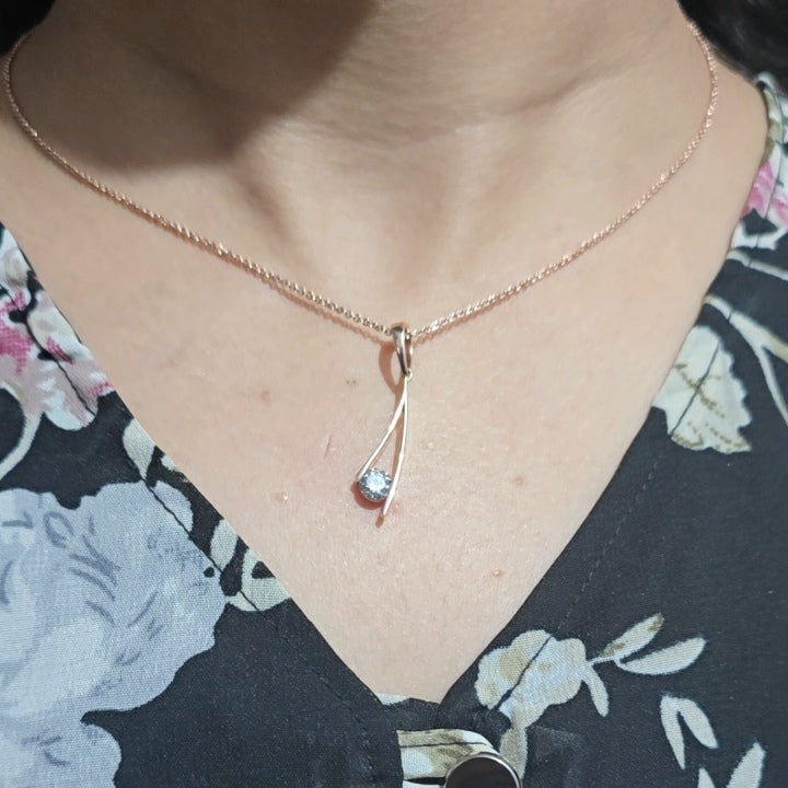 Graceful Curves: Salt & Pepper Diamond Pendant in Round Cut