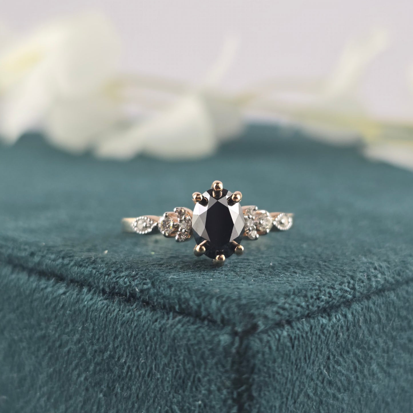 Rose Gold Black Diamond Ring – Oval Cut with White Stone Accents