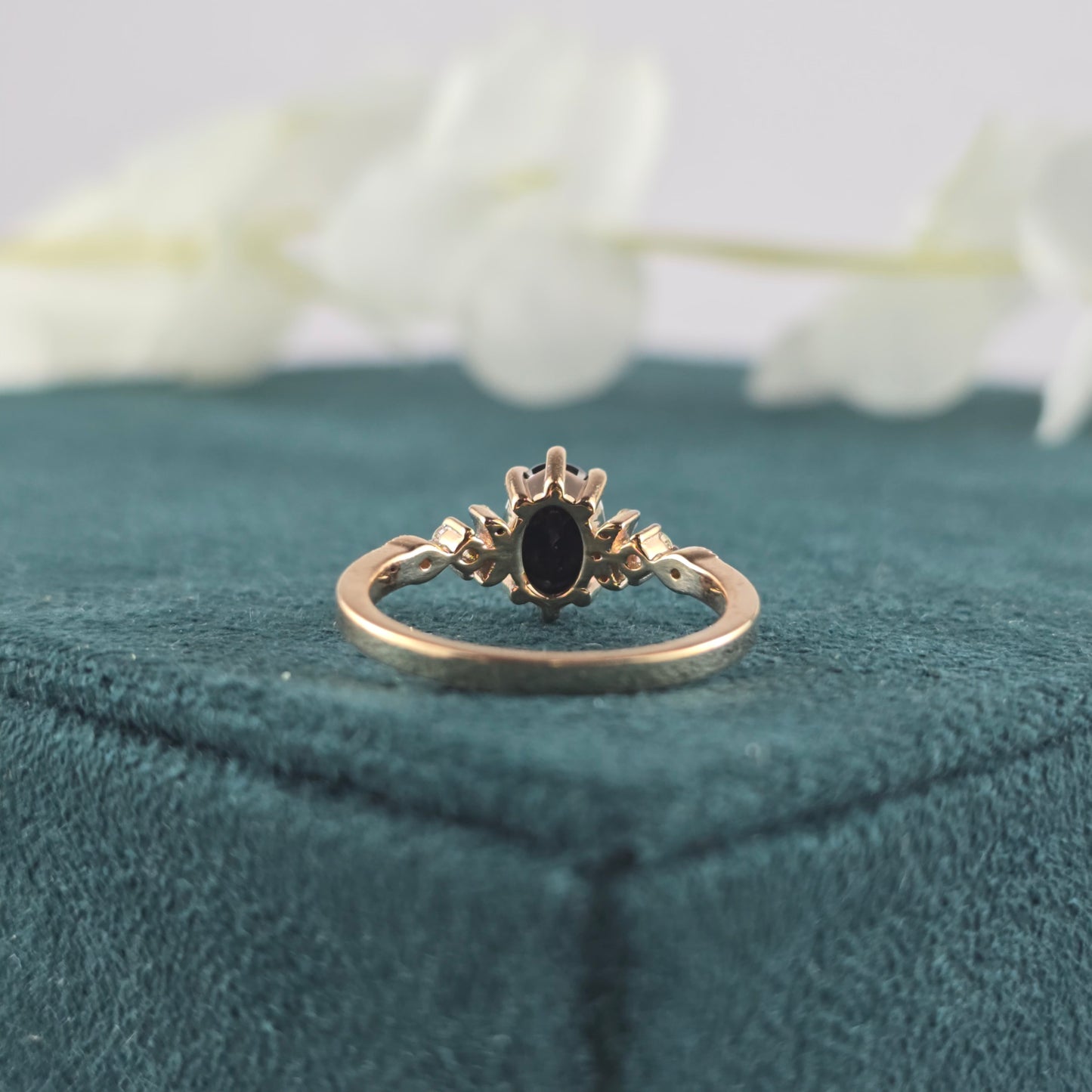 Rose Gold Black Diamond Ring – Oval Cut with White Stone Accents