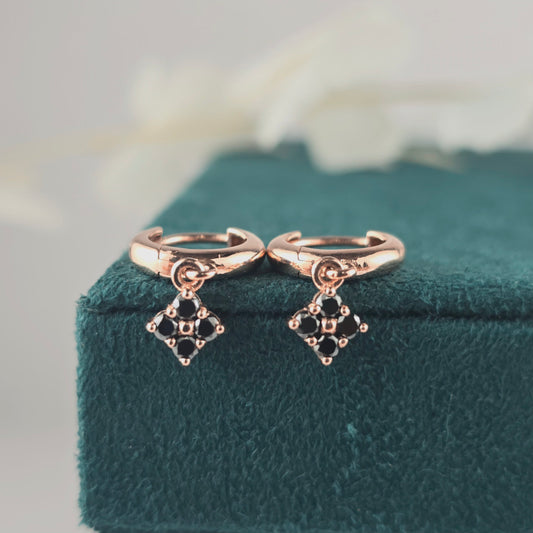 Asymmetrical Rose Gold Huggies – Black Diamond Charms