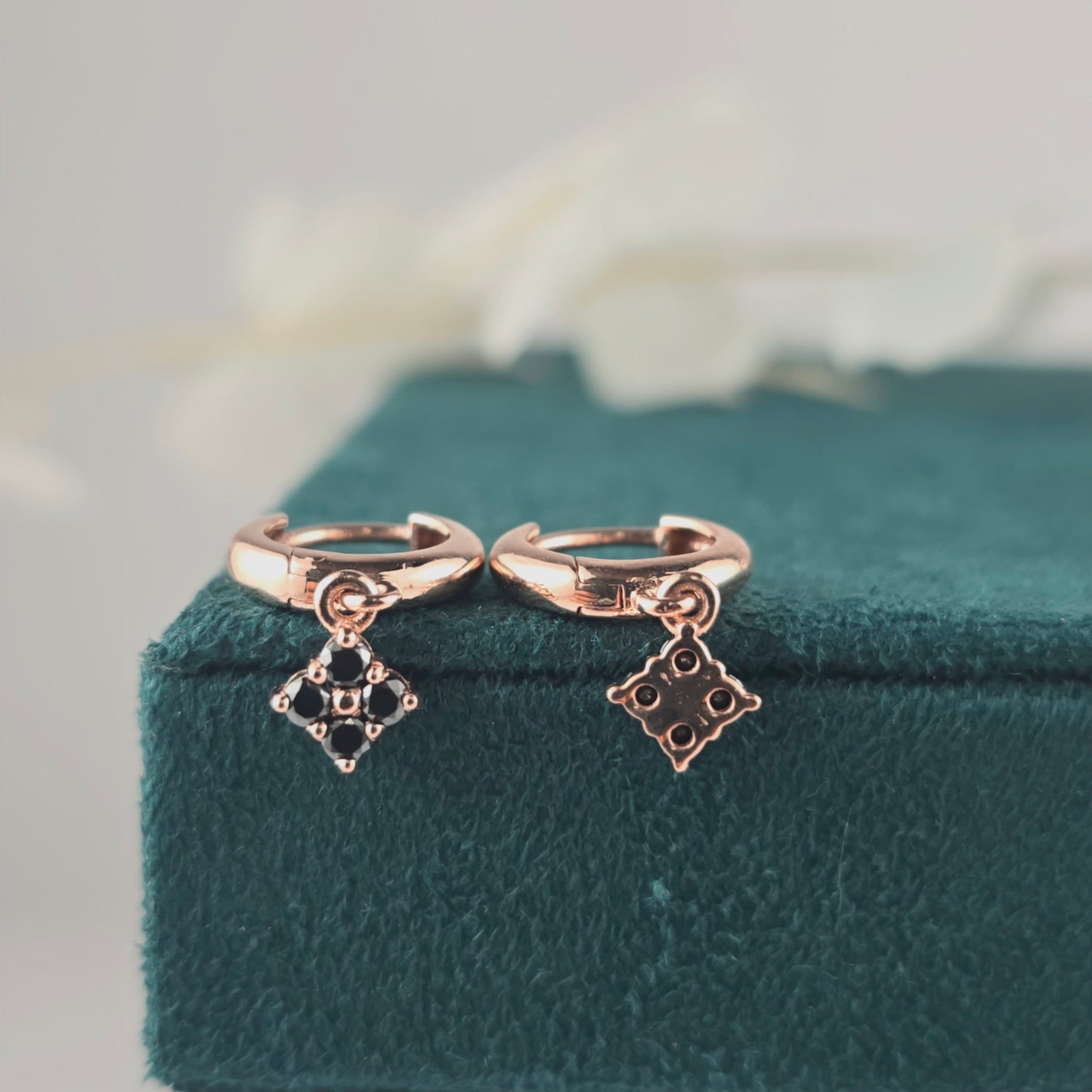 Asymmetrical Rose Gold Huggies – Black Diamond Charms