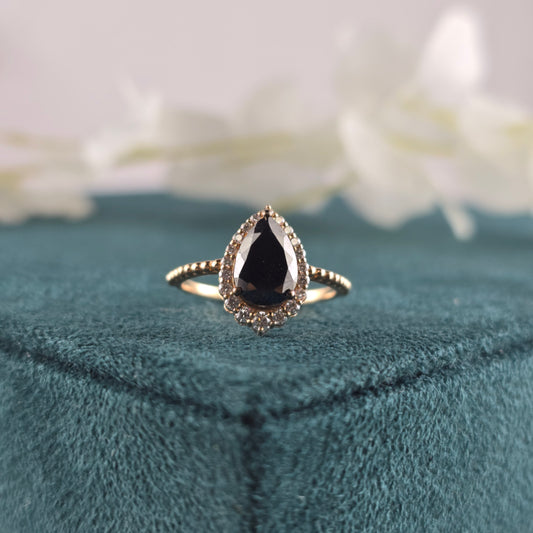 Make a Bold Promise with Our Pear & Round Natural Diamond Ring