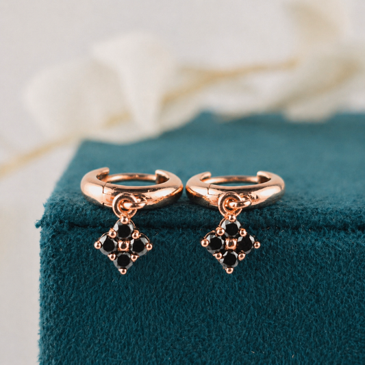 Asymmetrical Rose Gold Huggies – Black Diamond Charms