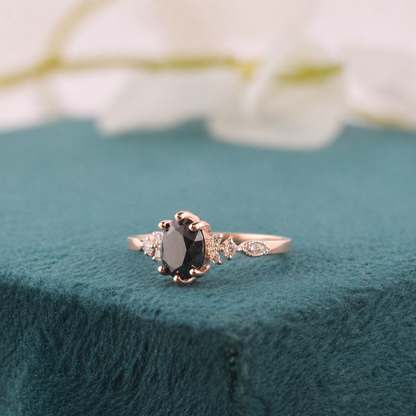 Rose Gold Black Diamond Ring – Oval Cut with White Stone Accents