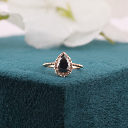 Make a Bold Promise with Our Pear & Round Natural Diamond Ring