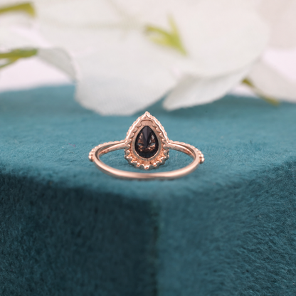 Make a Bold Promise with Our Pear & Round Natural Diamond Ring