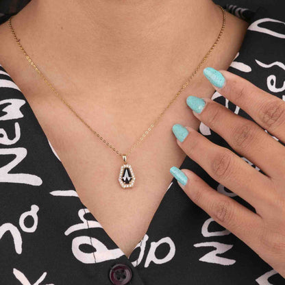 Gold Tone Coffin Pendant Necklace with Crystal Halo