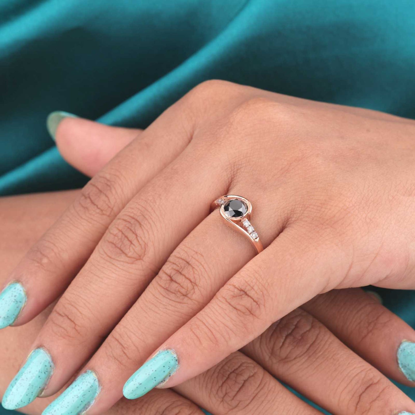 Twisted Rose Gold Ring – Black Stone with Diamond Accents