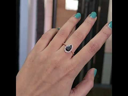 Make a Bold Promise with Our Pear & Round Natural Diamond Ring